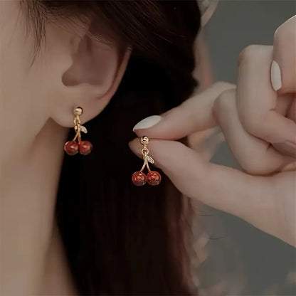 A Set of Three Stylish And Sexy Cherry Pendant Necklaces And Earrings