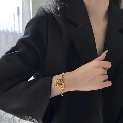 Elegant Vintage-Inspired 18K Gold Plated Titanium Steel Bracelet for Women - Perfect for Casual Attire