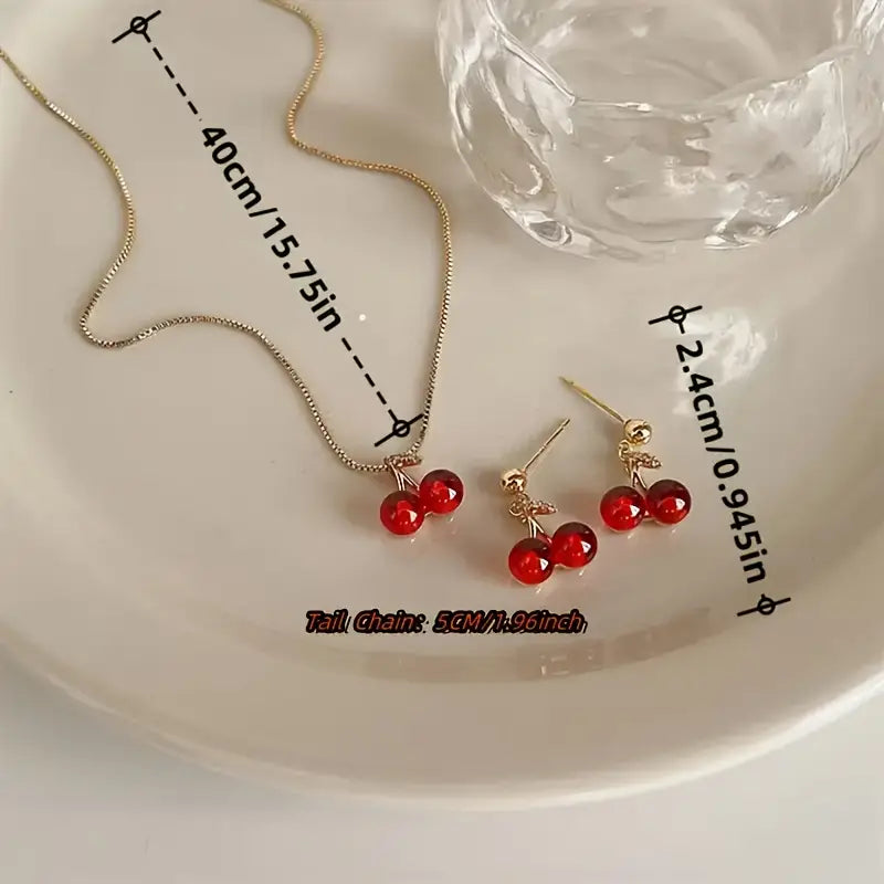 A Set of Three Stylish And Sexy Cherry Pendant Necklaces And Earrings
