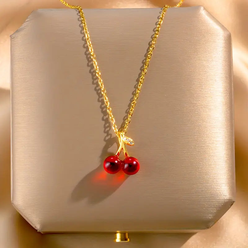 A Set of Three Stylish And Sexy Cherry Pendant Necklaces And Earrings