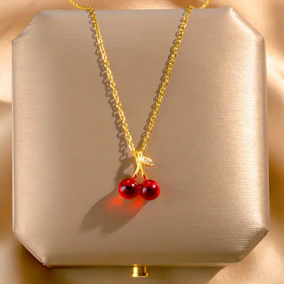 A Set of Three Stylish And Sexy Cherry Pendant Necklaces And Earrings
