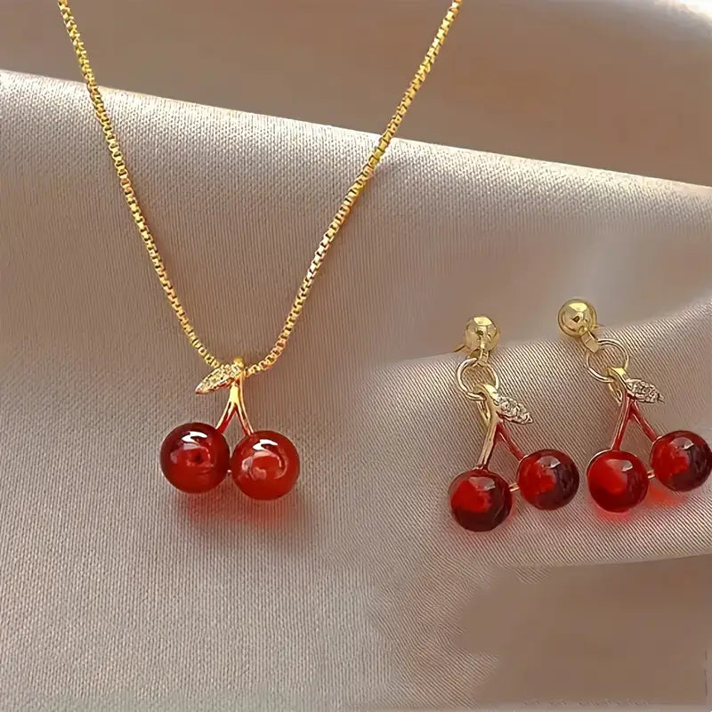 A Set of Three Stylish And Sexy Cherry Pendant Necklaces And Earrings